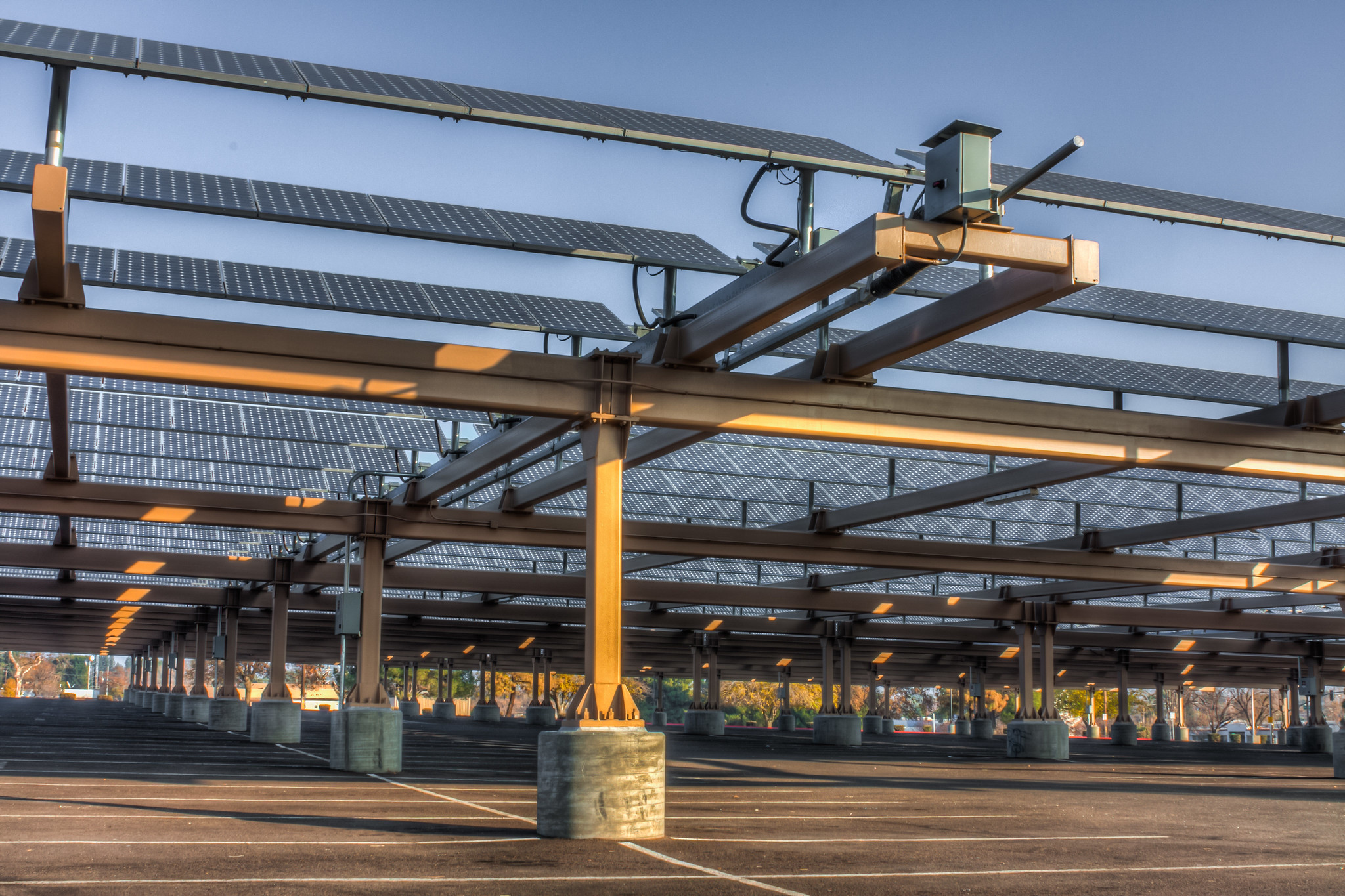 A solar array suspended over a parking lot in Kern County, California.